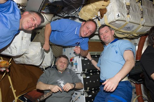 View of STS-134 / Expedition 28 Crew Members on the Shuttle Middeck