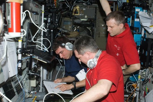 Expedition 28 Crew Members monitor Progress Approach/Docking