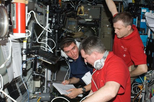 Expedition 28 Crew Members monitor Progress Approach/Docking