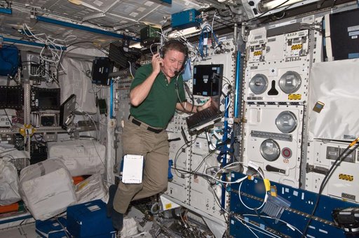 FE Fossum using Communication Equipment in the Columbus