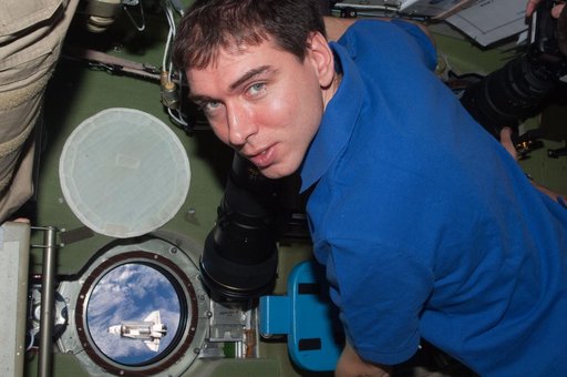 View of Expedition 28 Crew Member posing for photo in the Service Module