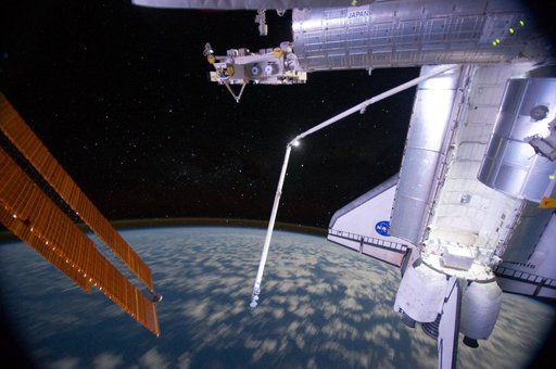 View of ISS and Atlantis taken at Night