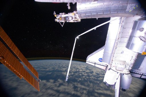 View of ISS and Atlantis taken at Night