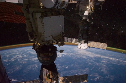 Airglow on the horizon against the starry sky view taken by the Expedition 29 crew