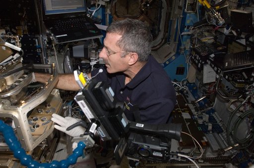 Burbank works at the LMM in the FIR/FCF in the U.S. Laboratory