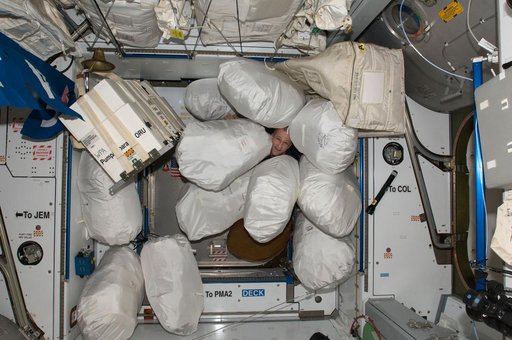 Trash and Excessed Equipment at the Node 2 FWD End Cone