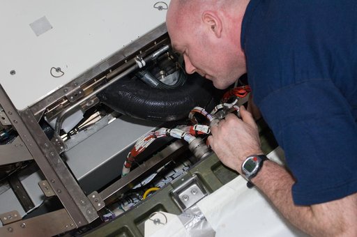 Kuipers installs and routes RCS Video Cables in the U.S. Laboratory