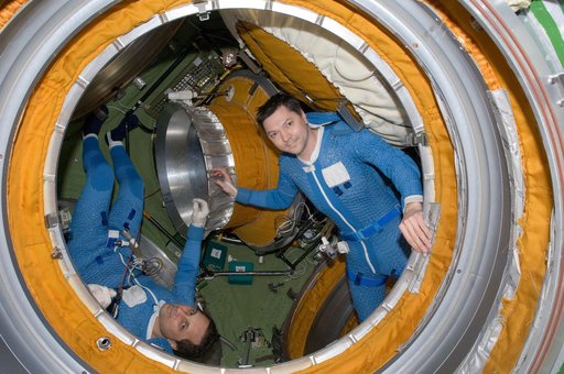Expedition 30 FEs prepare for EVA in the SM Transfer Compartment
