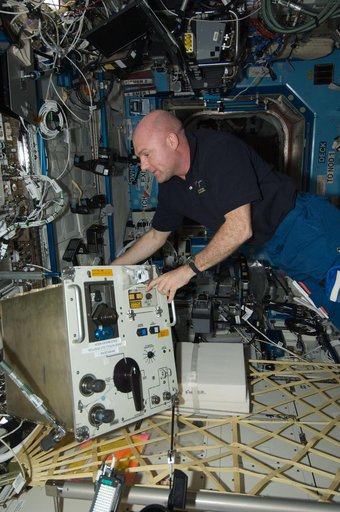 Kuipers performs scheduled in-flight maintenance on the PWD in the U.S. Laboratory