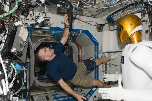 Pettit enters data in a laptop computer