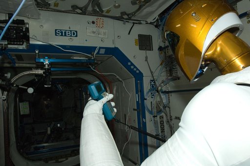 Robonaut 2 Humanoid Robot measures the air velocity in the U.S. Laboratory