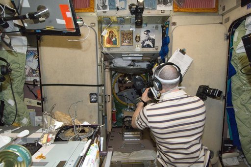 Ivanishin uses a video camera as ATV-3 hatch opens