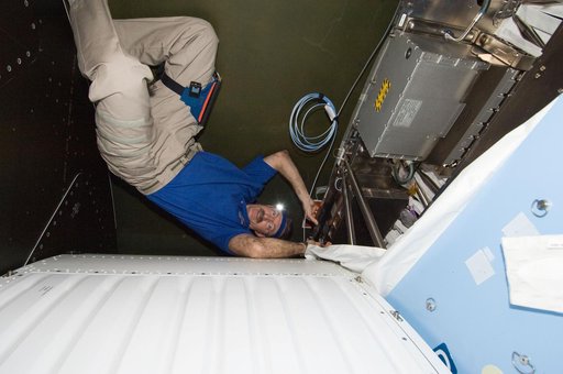 Burbank working on the MDM16C Assembly in the U.S. Laboratory