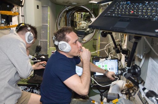 Expedition 30 crewmembers use TORU Docking System Controls
