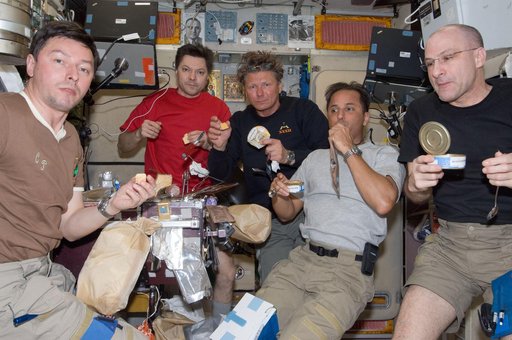 Expedition 31 Crewmembers Share a Meal in the SM