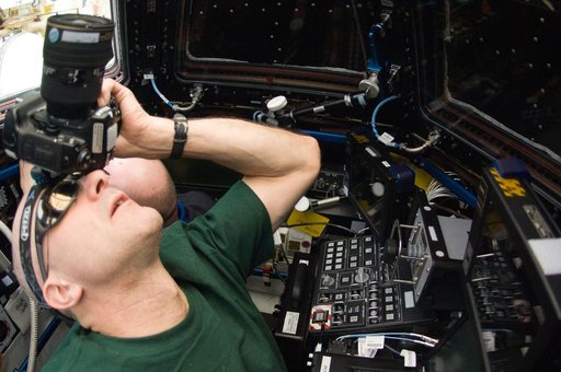 Pettit and Kuipers photograph Dragon Flyunder Operations from the Cupola