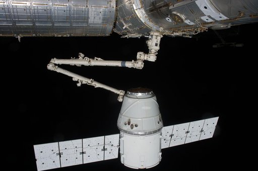 Dragon Spacecraft grappled by SSRMS