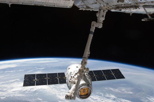 Dragon Spacecraft grappled by SSRMS