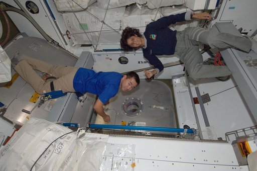 Expedition 32 Crew Members check the HTV3 Vestibule