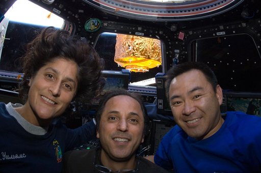 Expedition 32 Crew Members pose for a photo in the Cupola