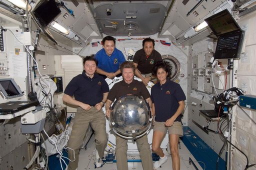 ISS032 crewmembers with Sfera satellite in JPM