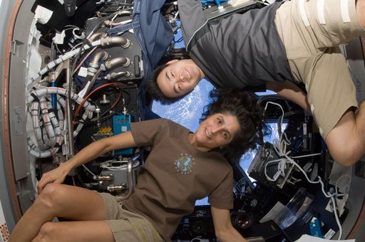 Williams and Hoshide in Cuploa photographed for outreach project