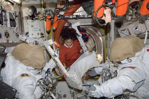 Williams in U.S. Airlock with EVA equipment