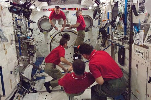 Expedition 34 crewmembers in the JPM