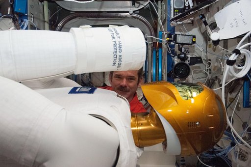 Hadfield works with Robonaut 2 hardware