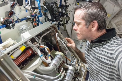 Hadfield with the Reassembled Amine Swingbed in the U.S. Lab