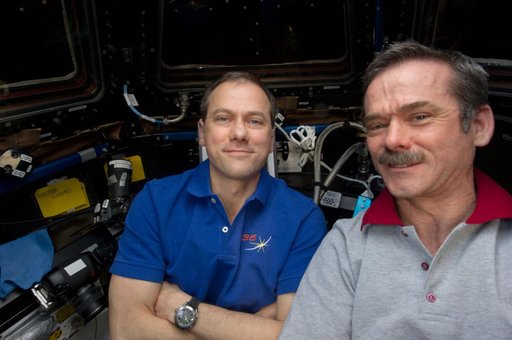 Marshburn and Hadfield in the Cupola