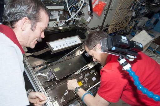 Hadfield and Marshburn during HRCS Ku Comm Unit 2 Installation