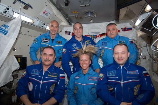 Crew photo during set-up for a videotape tribute to the 50th anniversary  of the 1963 launch of Vostok-6.