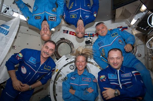 Crew photo during set-up for a videotape tribute to the 50th anniversary  of the 1963 launch of Vostok-6.