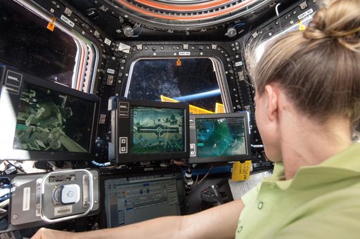 Nyberg at Robotics workstation in Cupola