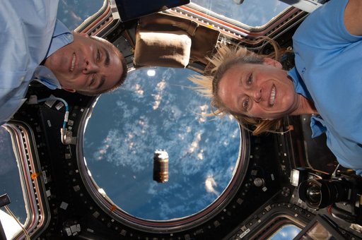Cassidy and Nyberg in Cupola during HTV-4 approach