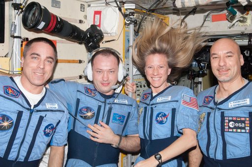 Expedition 36 crew in Penguin suit