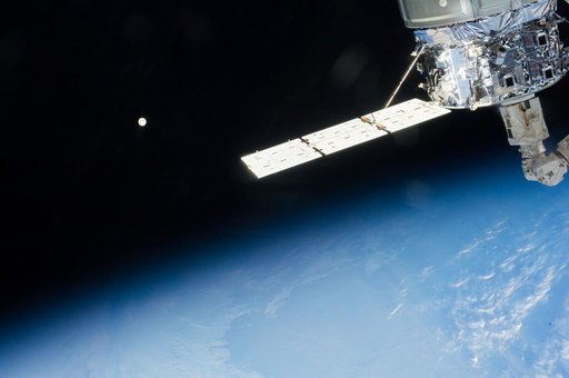View of Moon over Earth limb taken by the Expedition 37 crew.