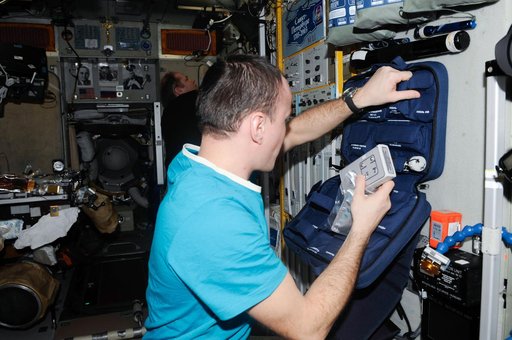 Ryazanskiy places monitor in bag