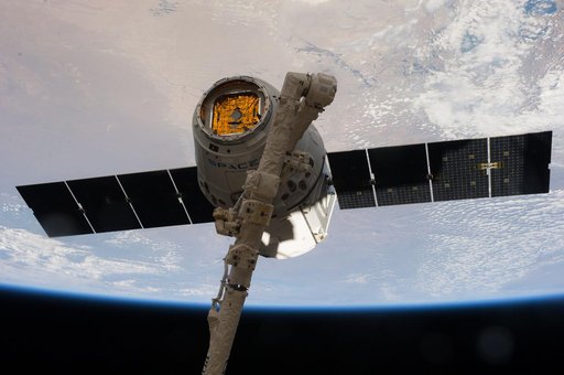 Dragon Spacecraft grappled by SSRMS
