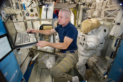 Swanson working in Airlock
