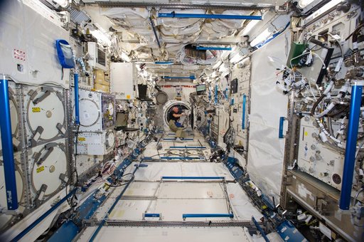 Gerst working on JEM airlock satellite deployer