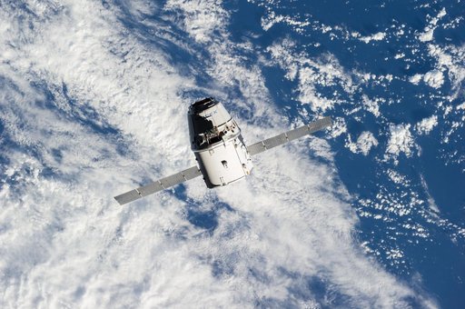 Space X-4 Dragon commercial cargo approaches the ISS