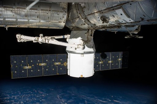 Space X-4 Dragon docked to the ISS
