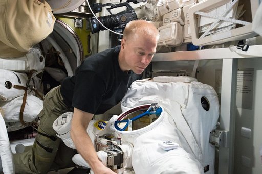 Kopra during EMU Cooling Loop Maintenance
