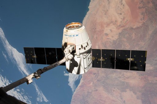 SpX-14 Dragon in position for release
