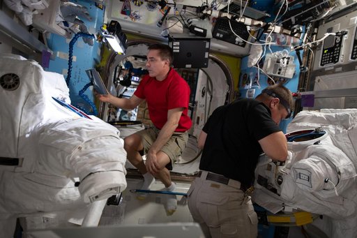 Behnken and Cassidy during EVA Preparations