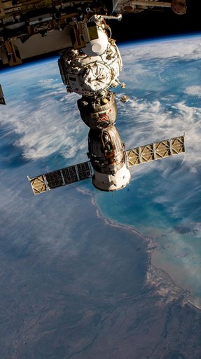 The space station orbits above Queensland, Australia