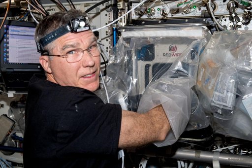 Astronaut Stephen Bowen Works With BFF