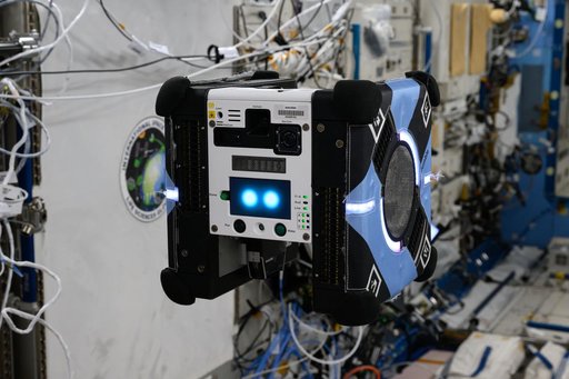 A free-flying Astrobee robot pictured aboard the International Space Station